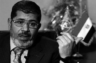 عکس خبري -مرسي وارد دادگاه شد