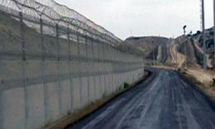 عکس خبري -ساخت ديوار امنيتي صهيونيست‌ها در مرز اردن