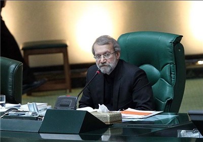 عکس خبري -تبريک لاريجاني در مجلس