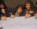عکس خبري -امضاء طومار و درخواست براي اجراي قانون عفاف و حجاب