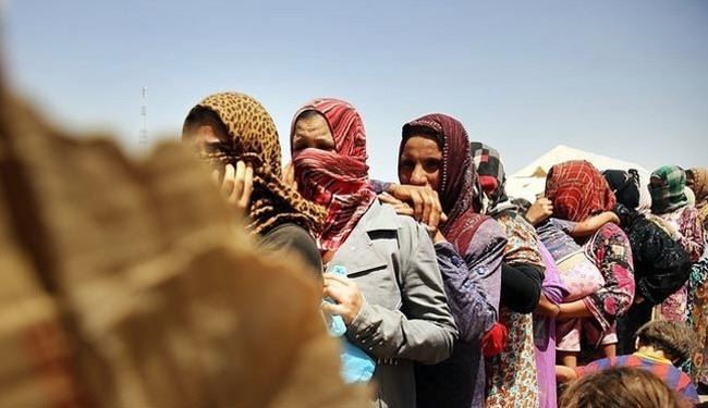 عکس خبري -اعتراض زنان عراقي به جنايات داعش 