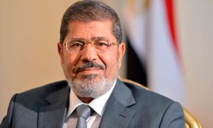 عکس خبري -مرسي به دادگاه منتقل شد