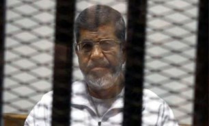 عکس خبري -زندگي ابدي محمد مرسي پشت ميله هاي زندان