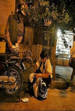 عکس خبري -گزارش تصويري/توزيع افطار ميان کارتن‌ خواب‌هاي پايتخت