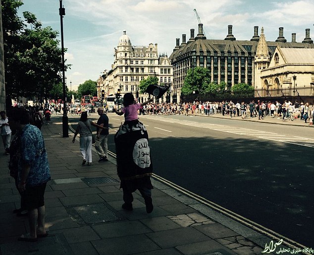 عکس خبري -قدم زدن با پرچم داعش در لندن! +عکس