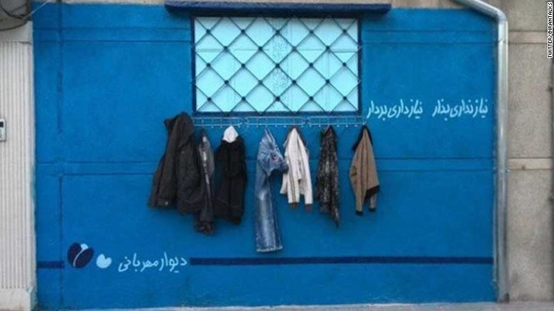 عکس خبري -ديوار مهرباني ايرانيان، جهان را تحت تاثير قرار داد