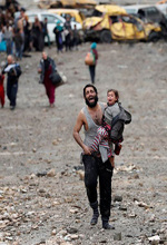 عکس خبري -گزارش تصويري/ فرار 50 هزار عراقي از موصل‎