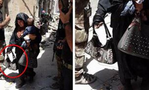عکس خبري -زن داعشي خود و کودک در آغوشش را منفجر کرد+ عکس
