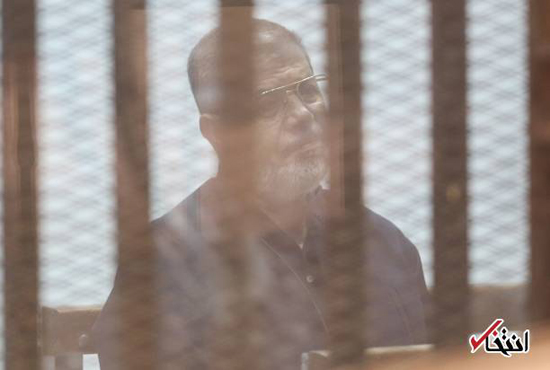 عکس خبري -محاکمه مرسي و رهبران اخوان المسلمين در قفس