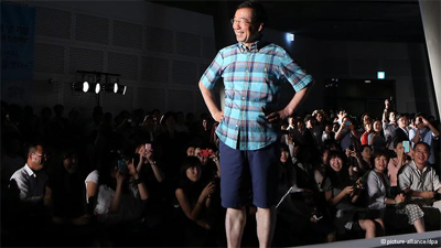 عکس خبري -تشويق کارمندان مرد کره‌جنوبي به پوشيدن شلوارک +عكس شهردار
