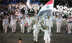 عکس خبري -دست رد پرچمدار تيم المپيک سوريه به مخالفان نظام بشار اسد