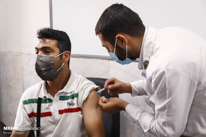 عکس خبري -تزريق دوز دوم واکسن کارگران ميادين ميوه و تره بار آغاز شد